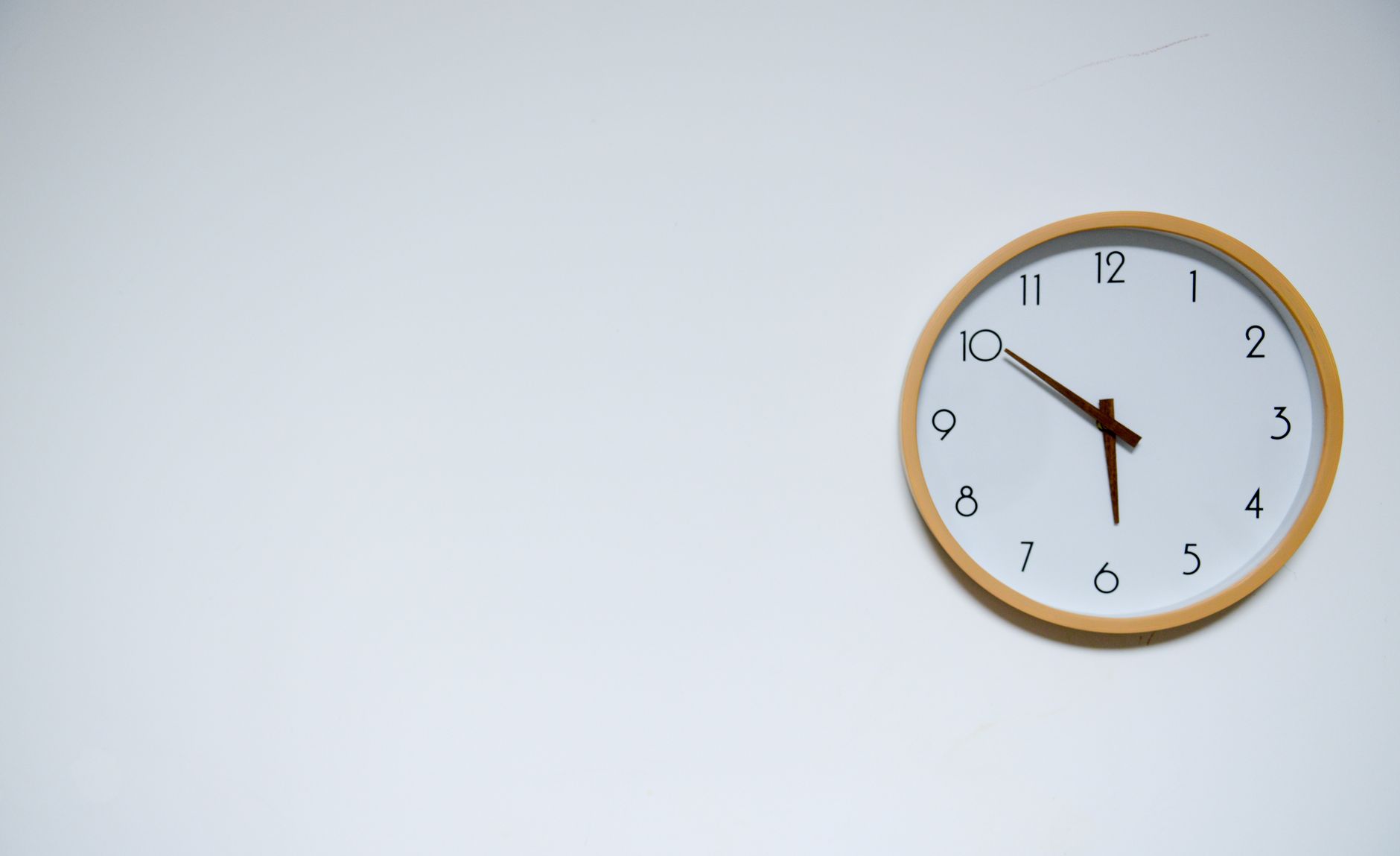 A clock on an office wall
