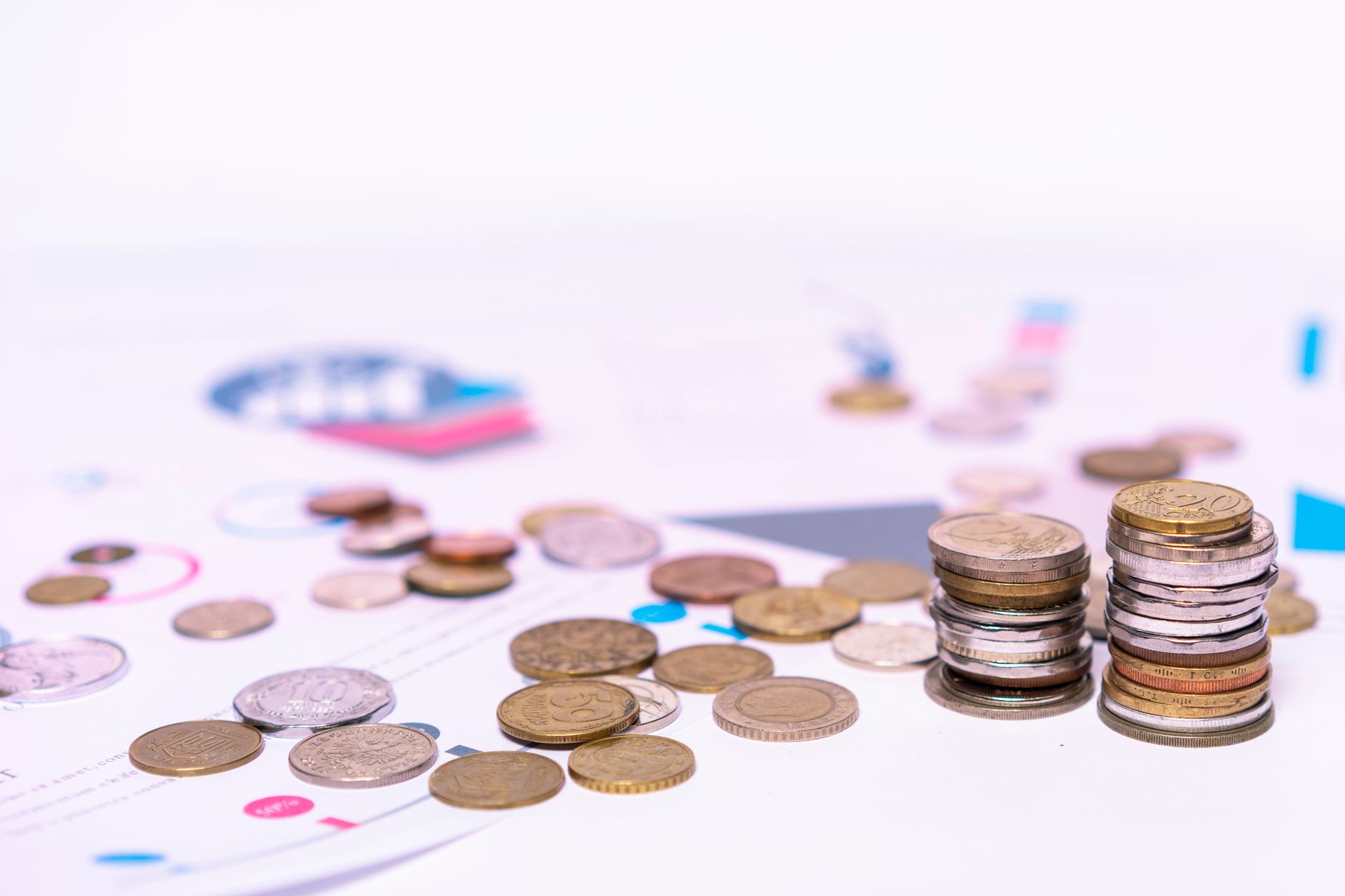 British pound coins stacked on a calculator representing the real Kickstarter consultant cost