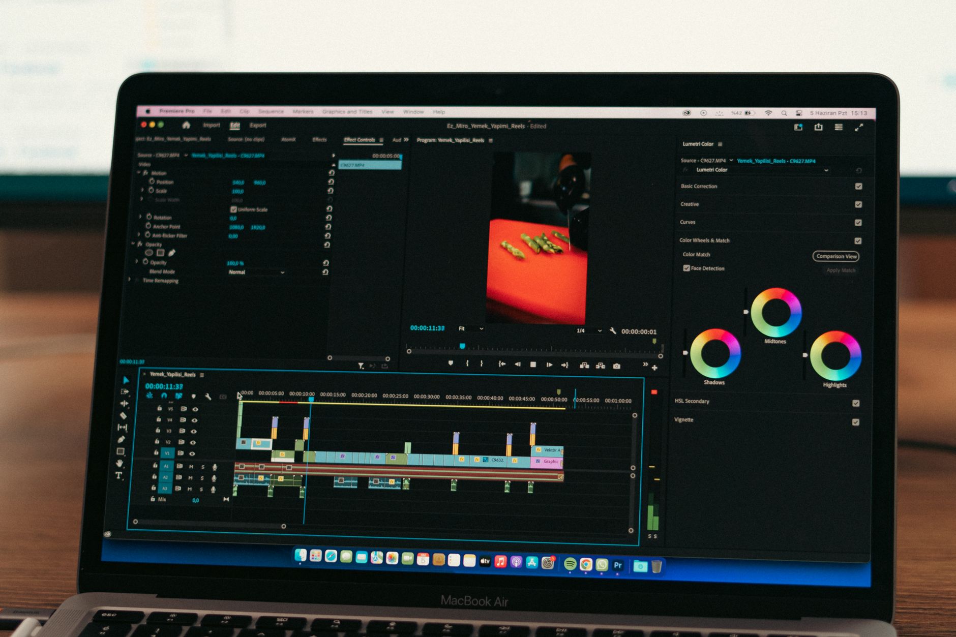 Founder editing a Kickstarter campaign video on a laptop at a desk